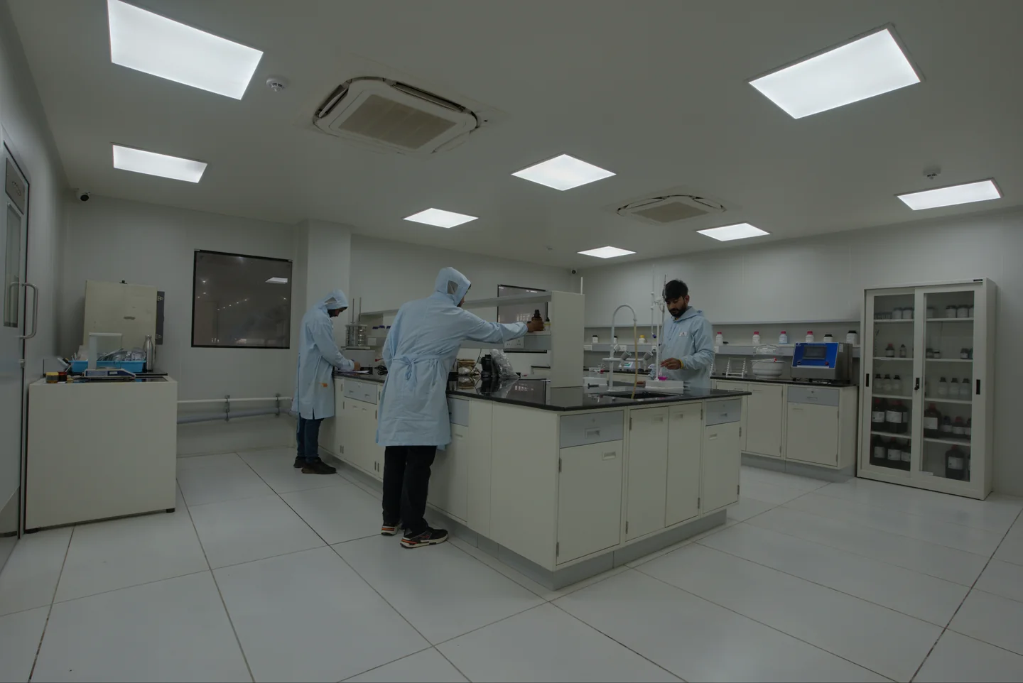 Shree Additives staff working together in the company laboratory